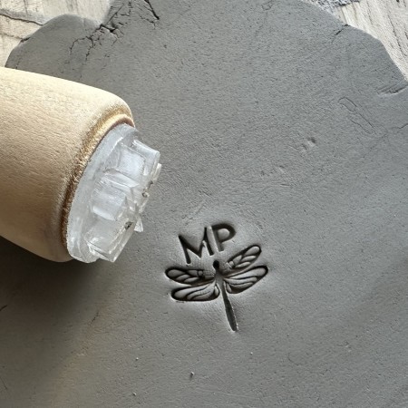 Personalized pottery stamp with initials and dragonfly