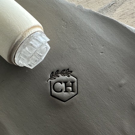 Personalized pottery stamp with initials and hexagon
