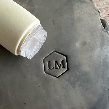 Personalized pottery stamp with initials and hexagon