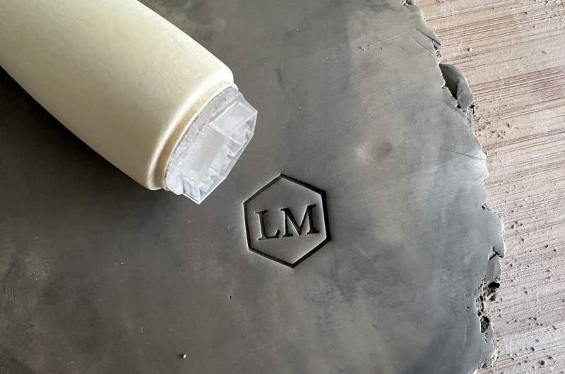 Personalized pottery stamp with initials and hexagon