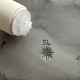 Personalized pottery stamp with initials and tribal sun