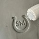 Personalized pottery stamp with initials and horseshoe