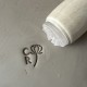Personalized pottery stamp with initials and flower