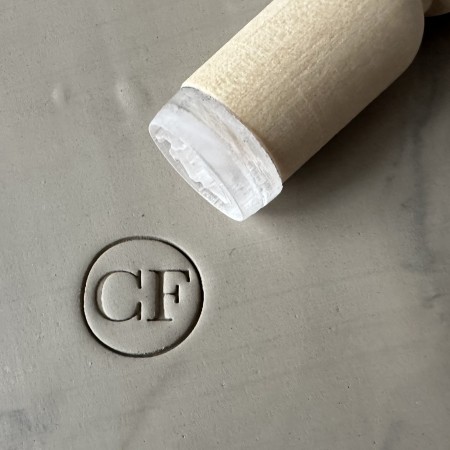 Personalized pottery stamp with initials and circle