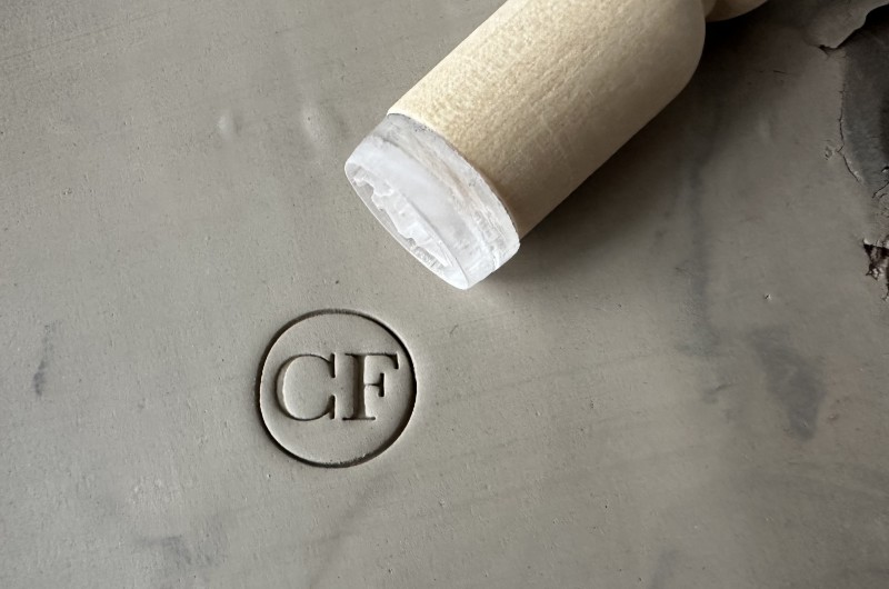 Personalized pottery stamp with initials and circle