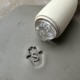 Personalized pottery stamp with letter and hand